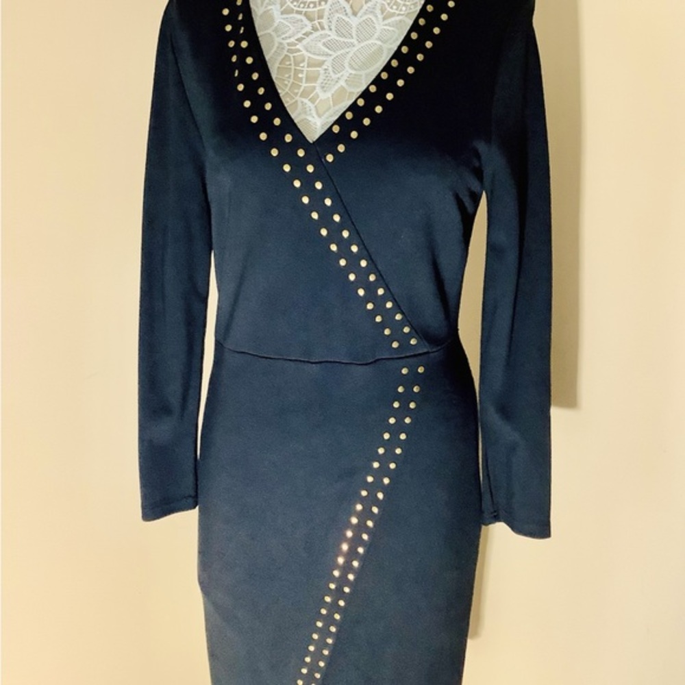 Carmen Marc Valvo‎ black dress with gold studs.